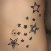 Татуювання зірка на животі